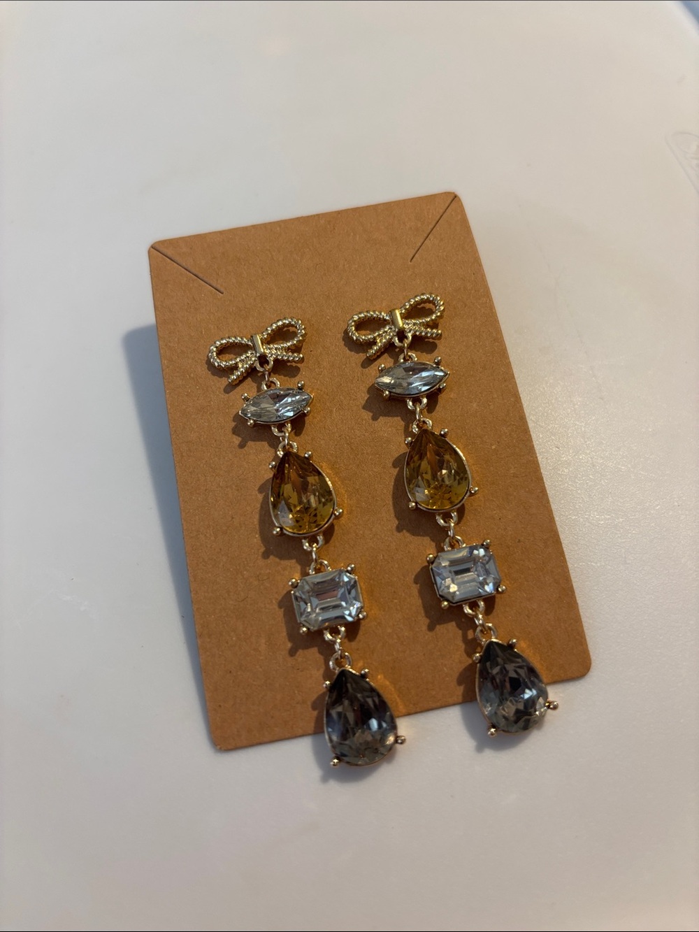 Fashion Jewelry Gold Bow Drop Earrings with Yellow and Gray Stones